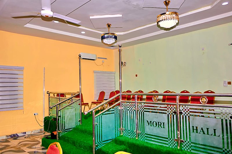 Stage approach with chandeliers overhead